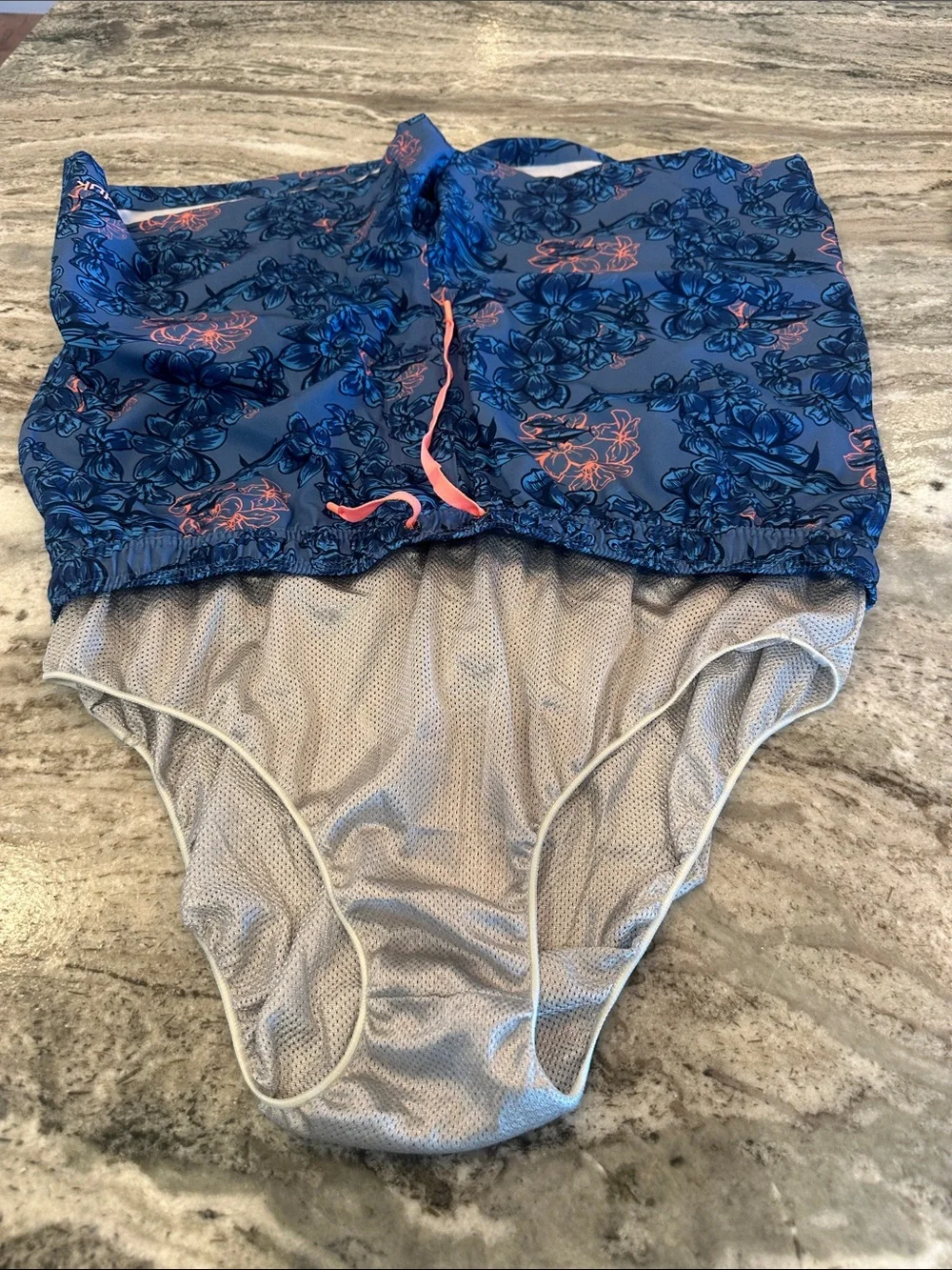 Huk Men’s Blue Floral Swim Trunks with Coral Drawstring